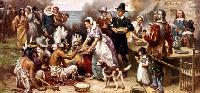 Dipinto che ritrae il primo pranzo del Giorno del Ringraziamento negli USA, raggruppando nativi e gli immigranti appena arrivati